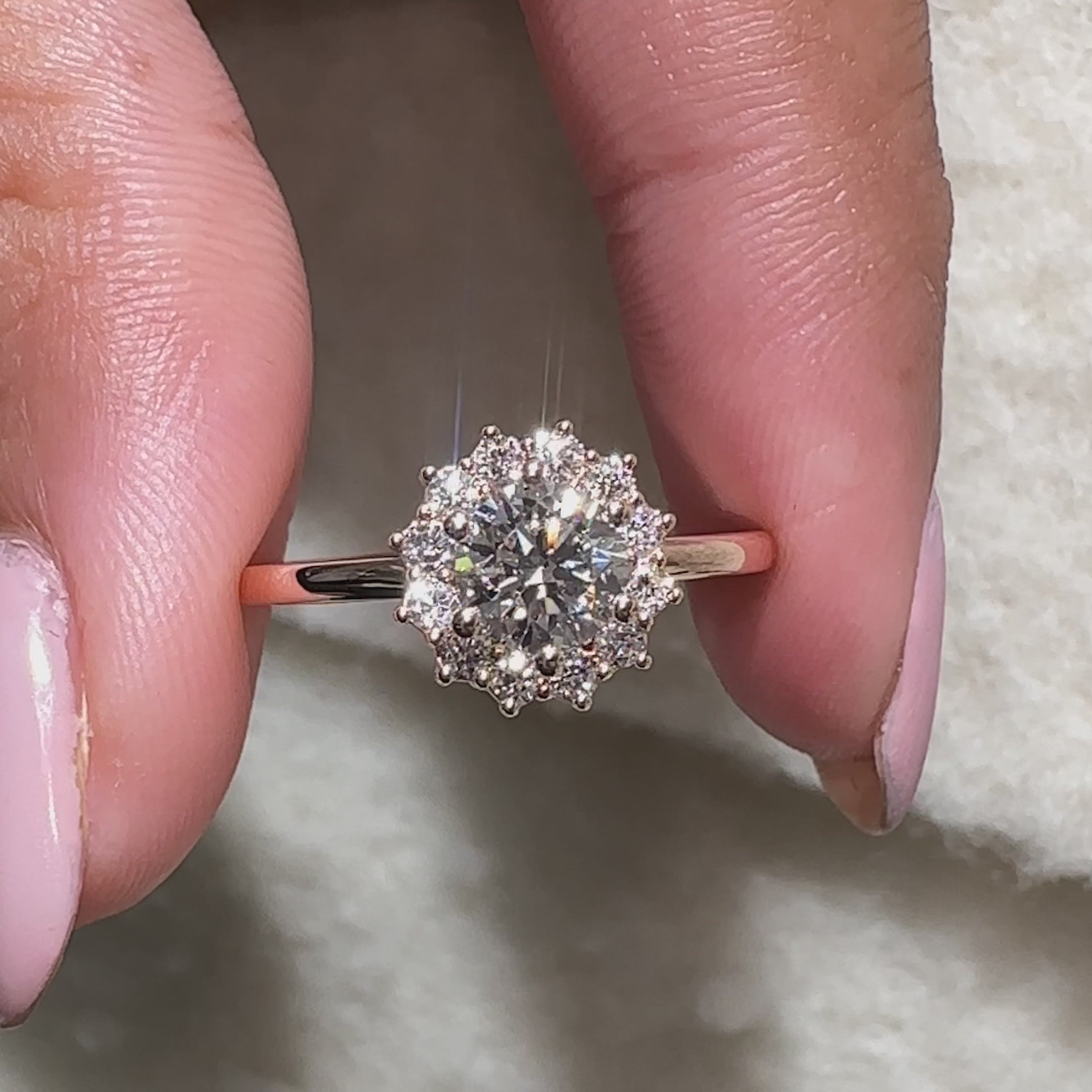 round cut lab grown diamond engagement ring in rose gold.