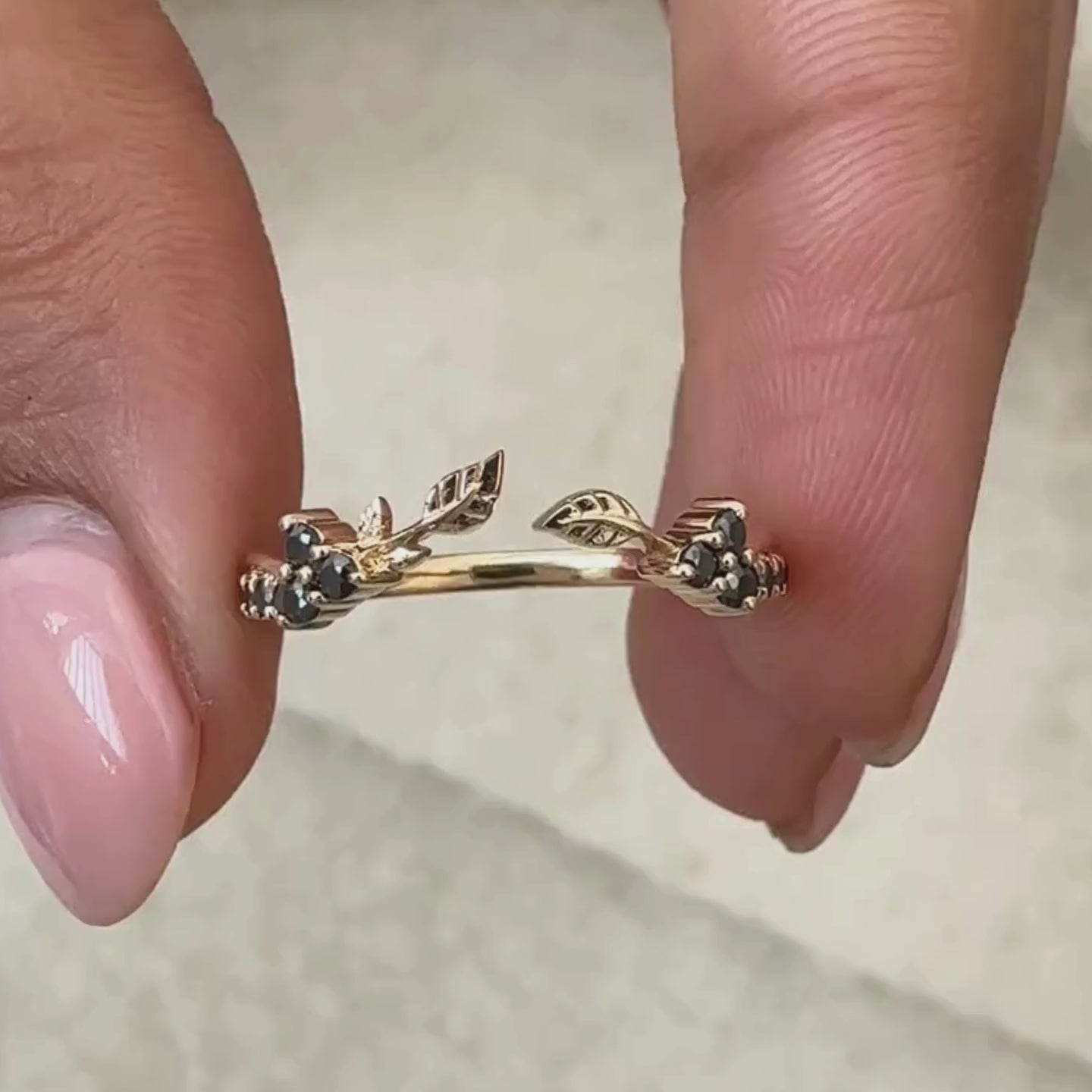 Avideri wedding band with black moissanite design and round moissanite stones.