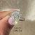 Lab grown diamond ring with half halo setting.