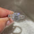 Round diamond ring with halo and pave style.
