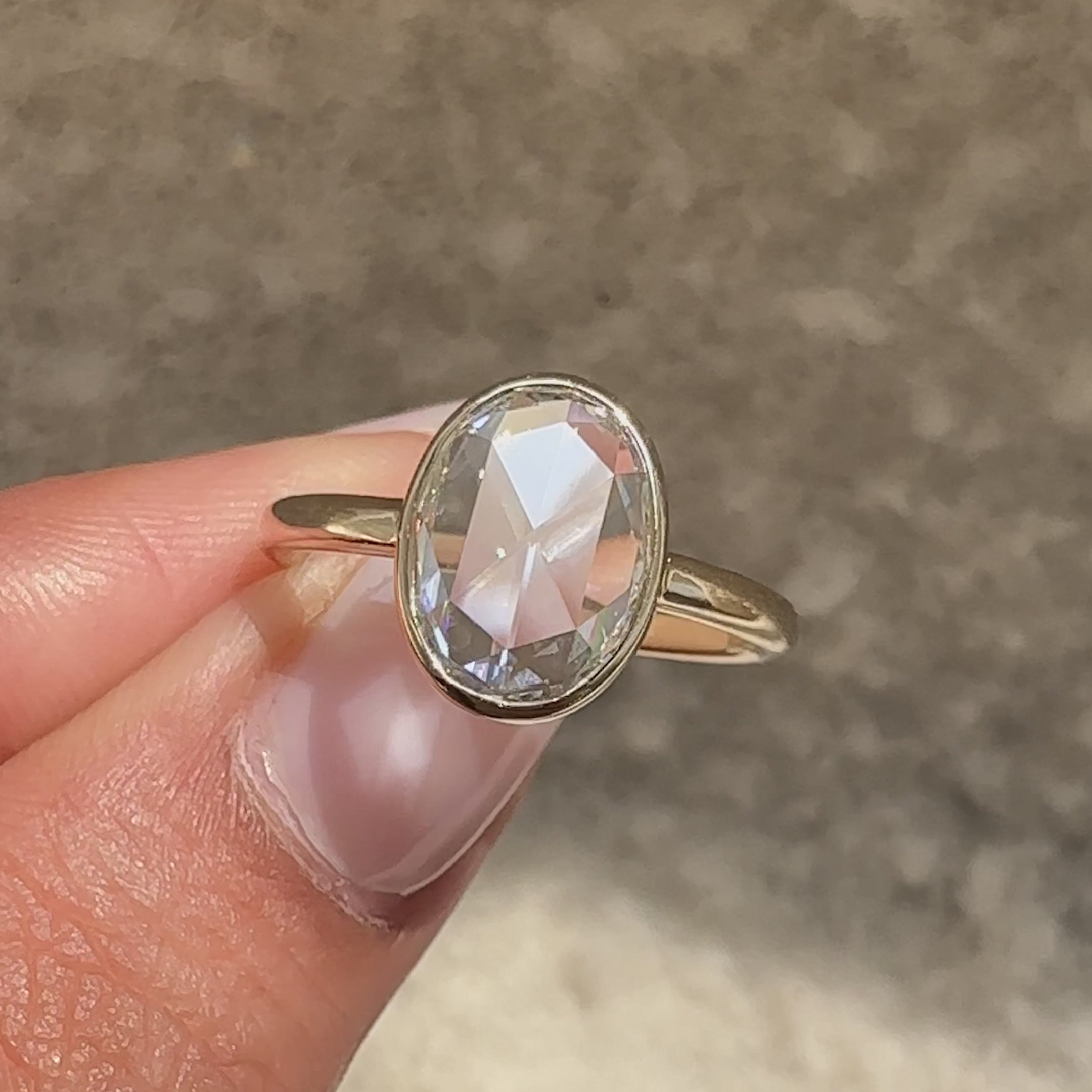 Handmade lab grown oval rose cut diamond ring.

