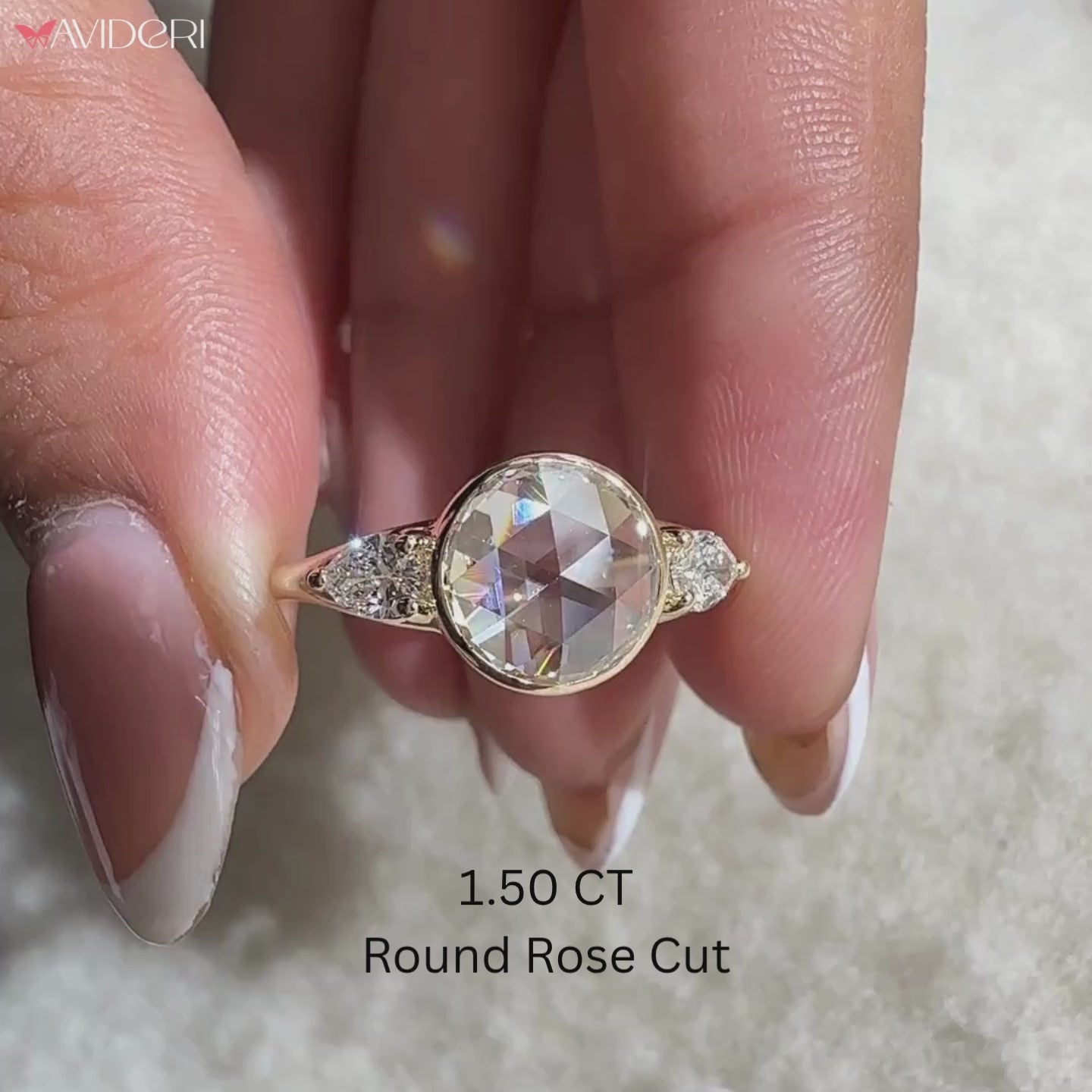 Avideri engagement ring on round rose cut diamond ring.
