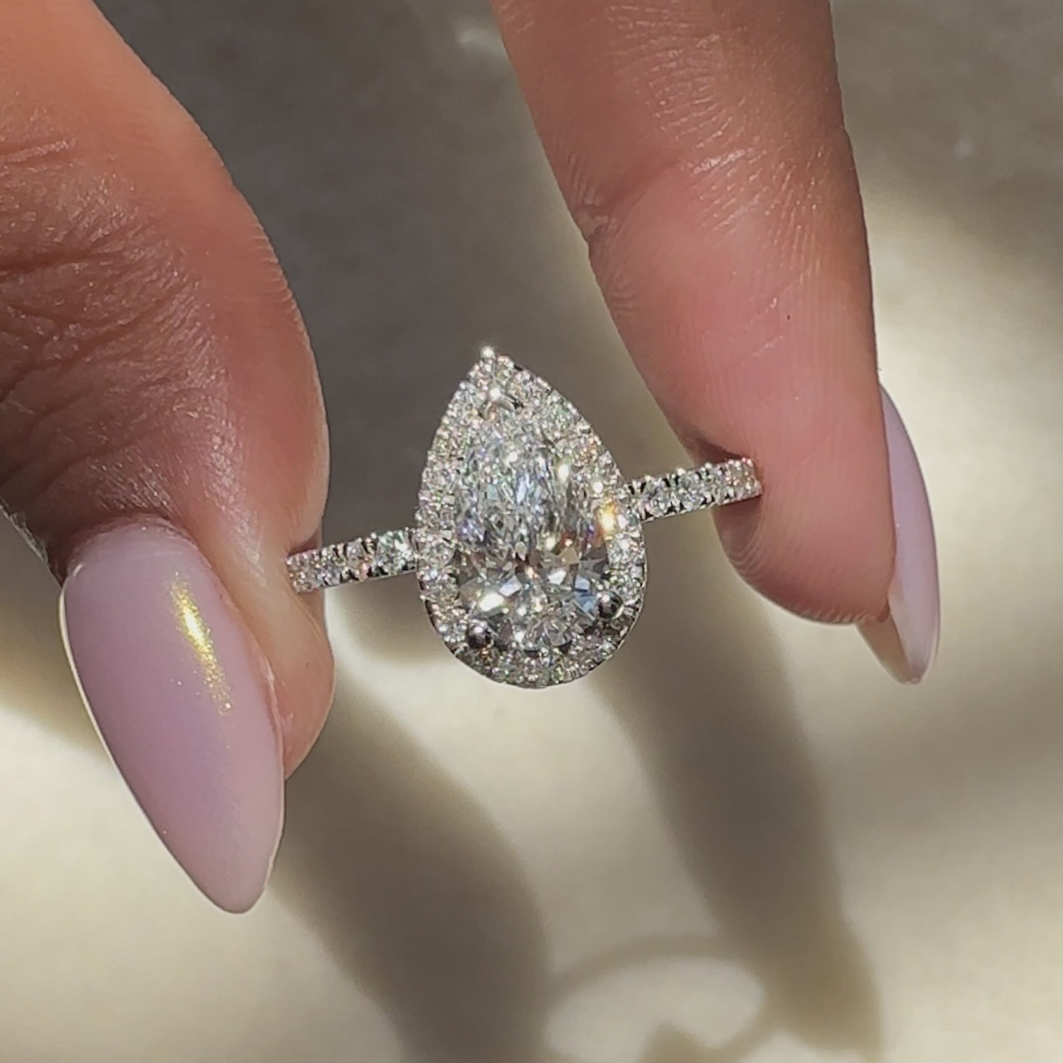 Lab grown diamond ring with pave and V prong setting.