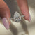 Lab grown diamond ring with pave and V prong setting.