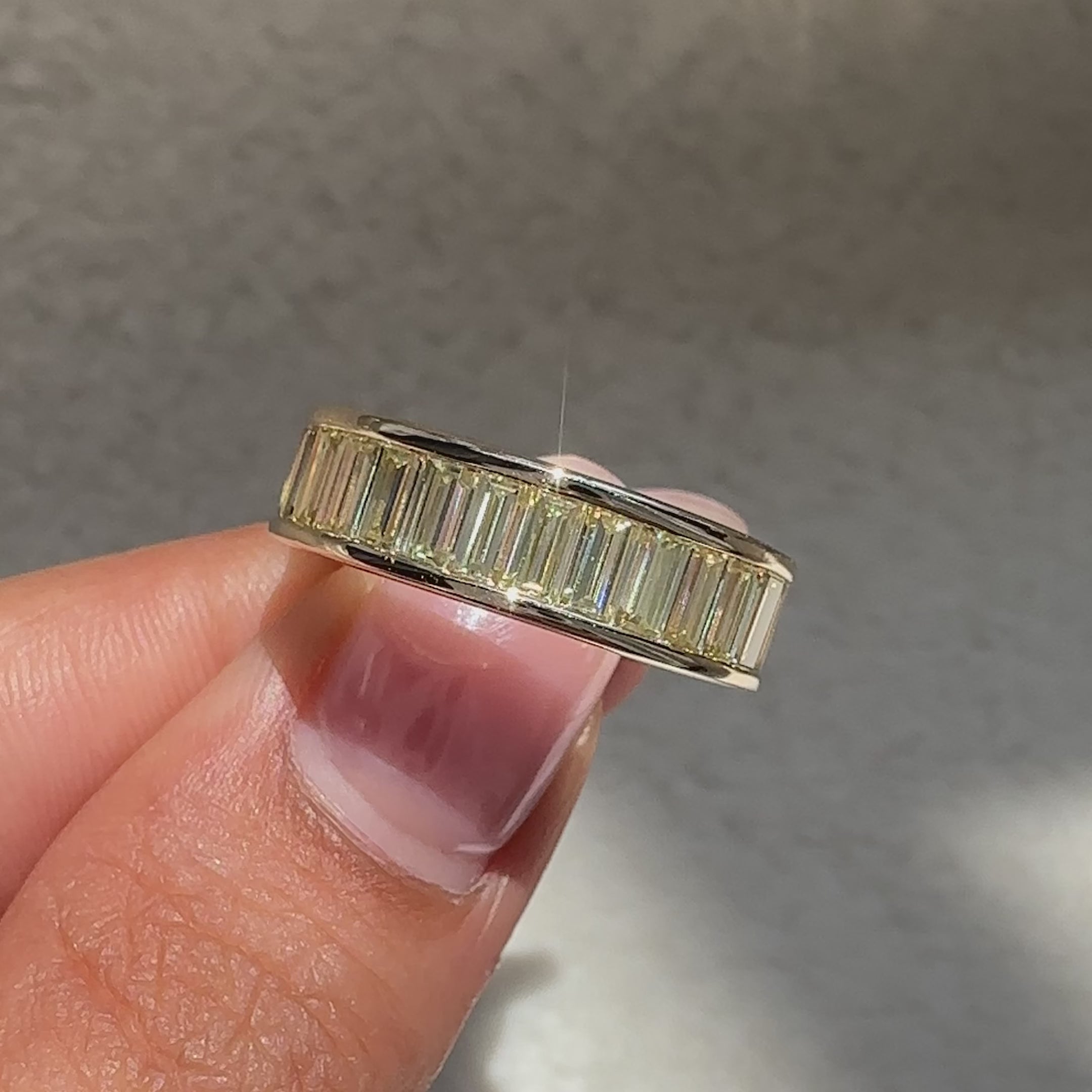 Channel setting band with baguette diamonds.

