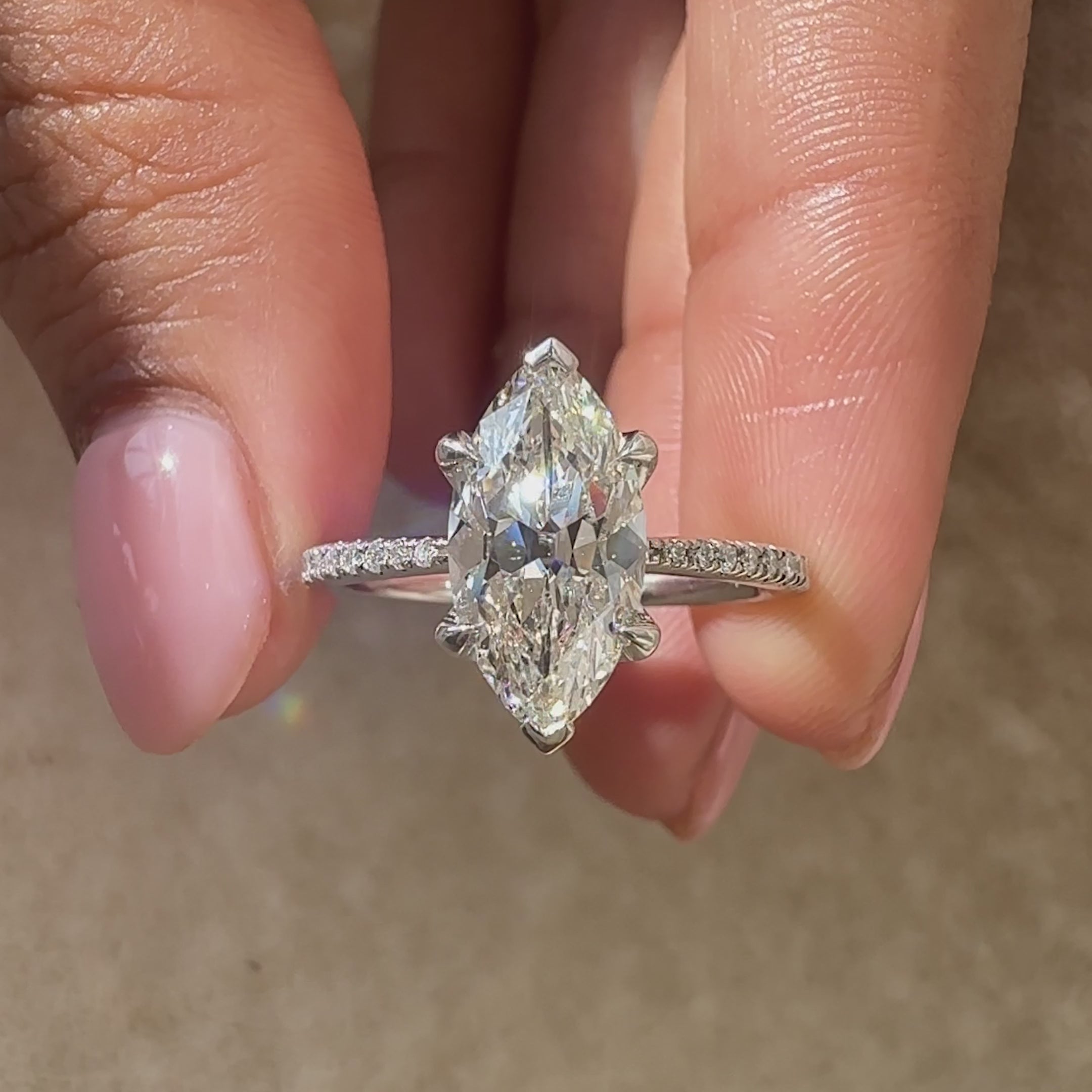 V shaped prong white gold diamond ring for special occasions.