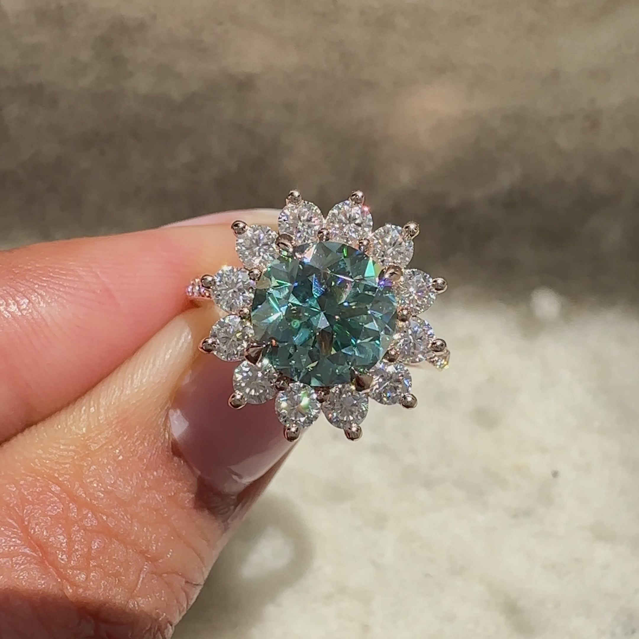 Round moissanite ring with pave and cluster style.
