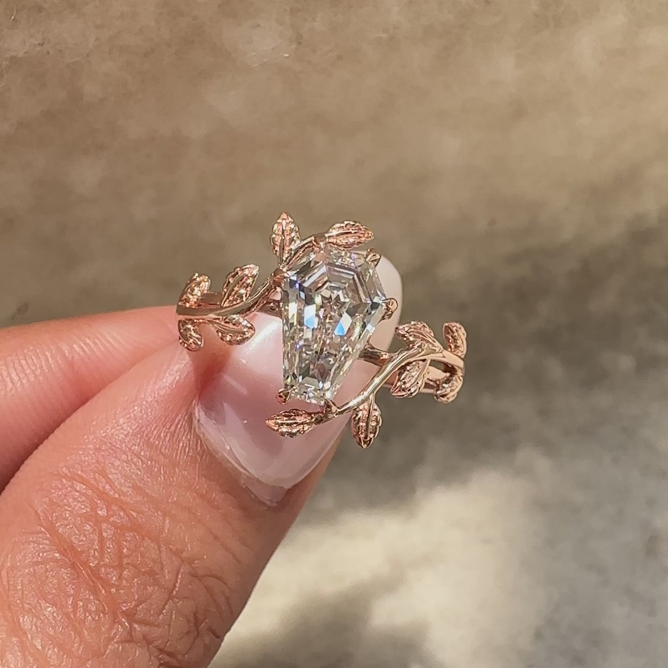 Modern coffin cut diamond engagement ring.
