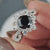 Halo engagement ring featuring a round cut ring for extra sparkle.

