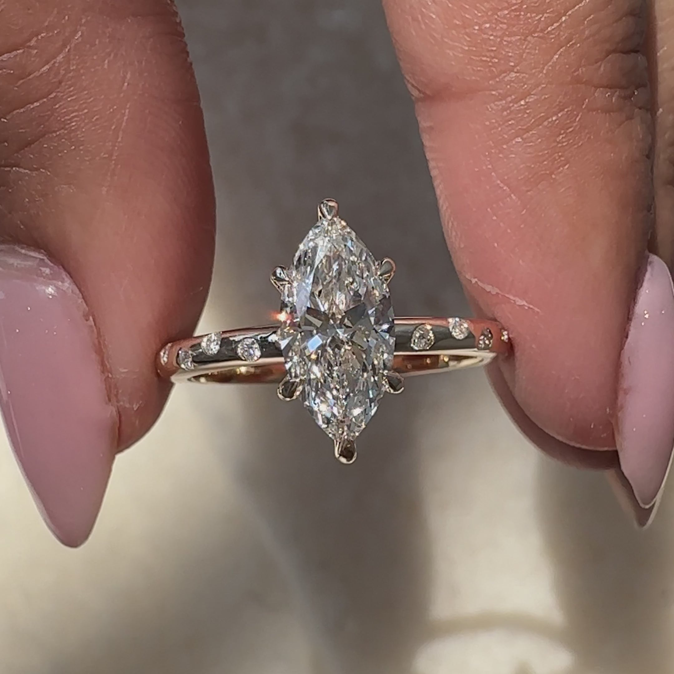 avideri engagement ring with marquise and round diamonds in unique pave shank.