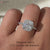 Classic cushion diamond ring with halo design.
