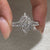 Handmade diamond wedding set with vintage inspired milgrain details
