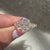 Three stone cushion ring with double prong set.
