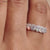 Moissanite gold wedding band pairs warm gold tones with radiant moissanite sparkle.
