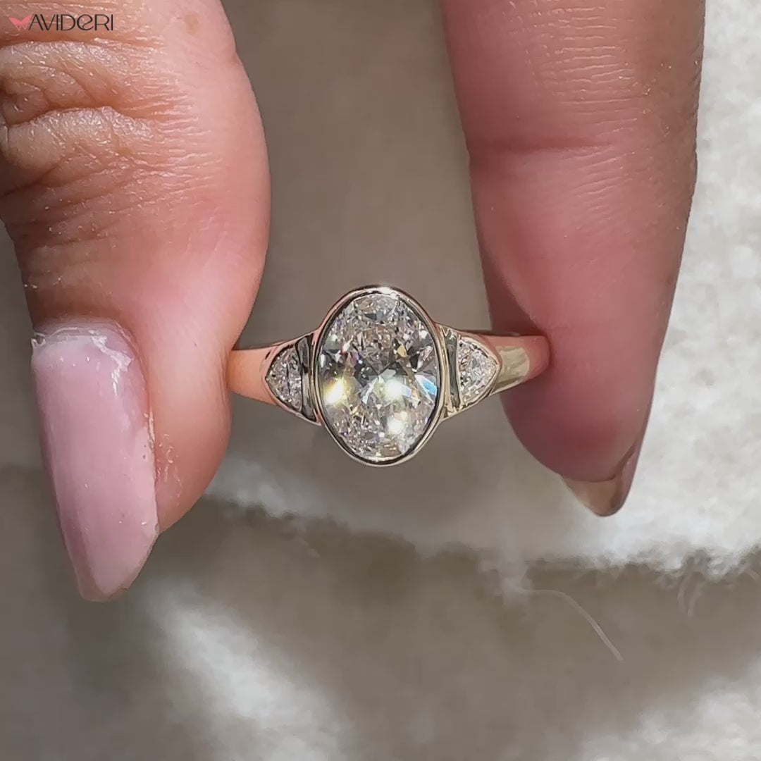 Avidéri custom engagement ring with bezel setting.