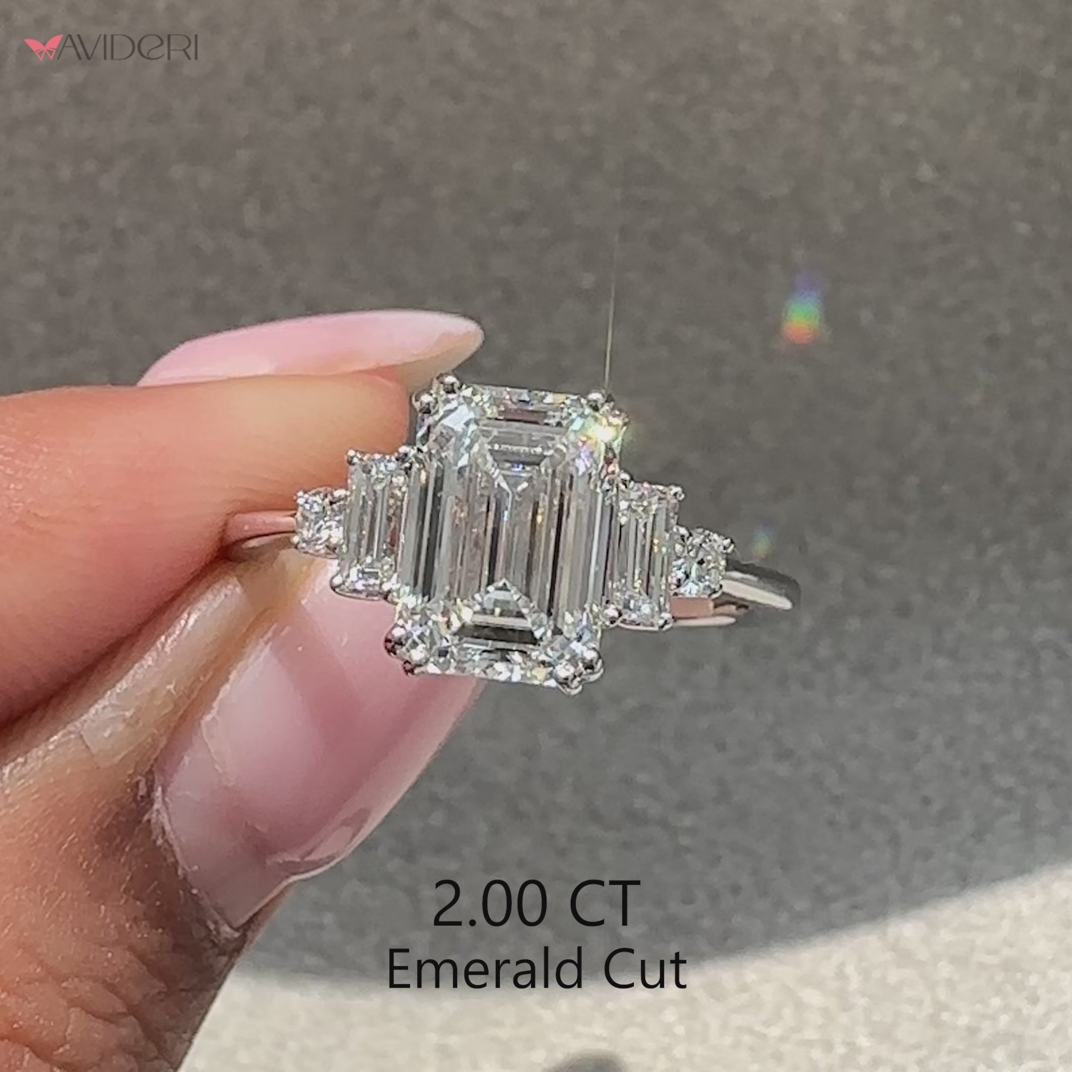 Handmade emerald cut five stone diamond ring.
