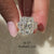 Three stone diamond ring with four claw prong setting.