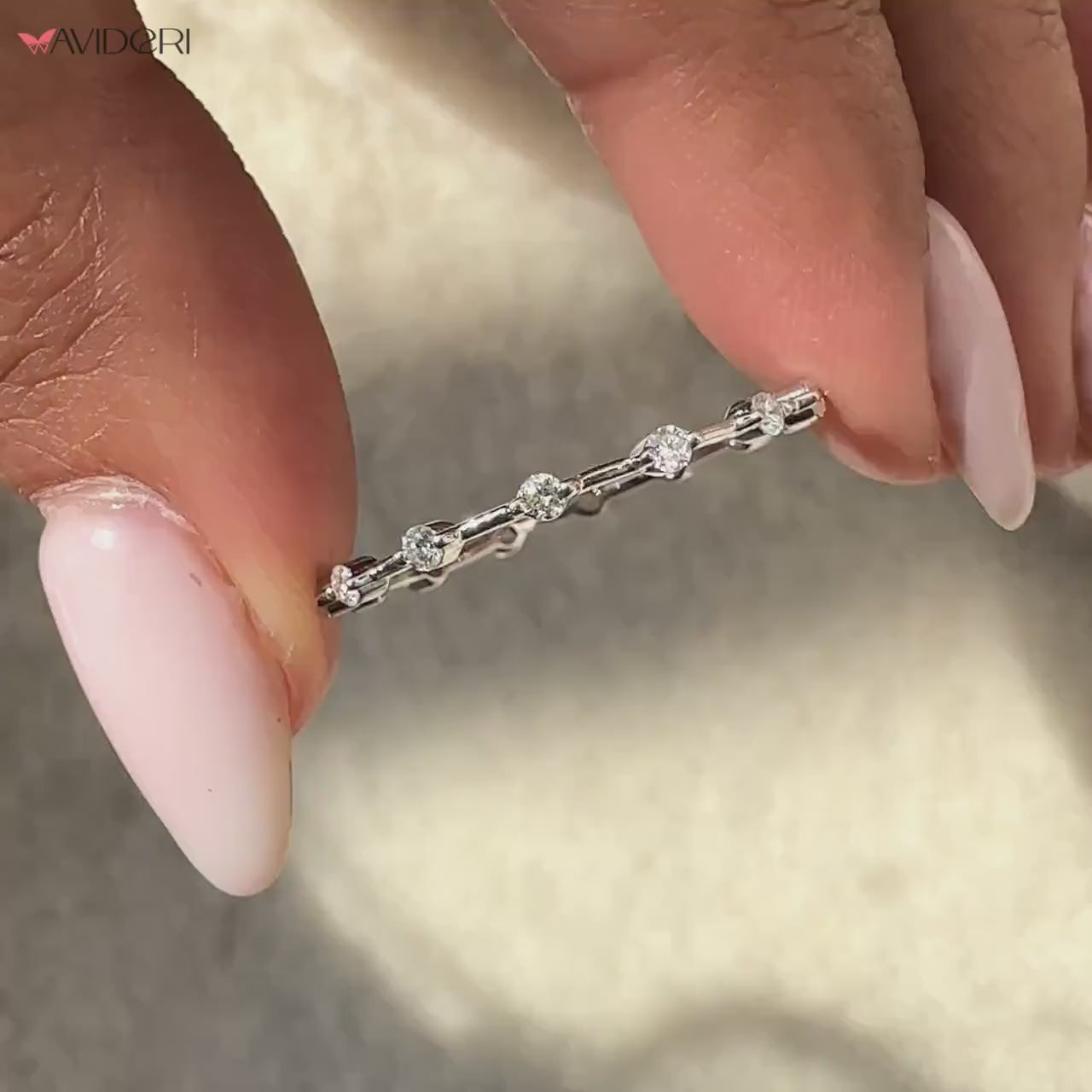 White gold band with lab grown diamond.