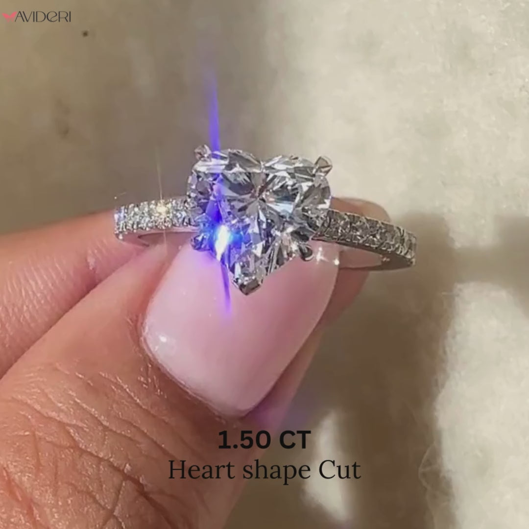 Heart shaped engagement ring with white gold engagement ring.