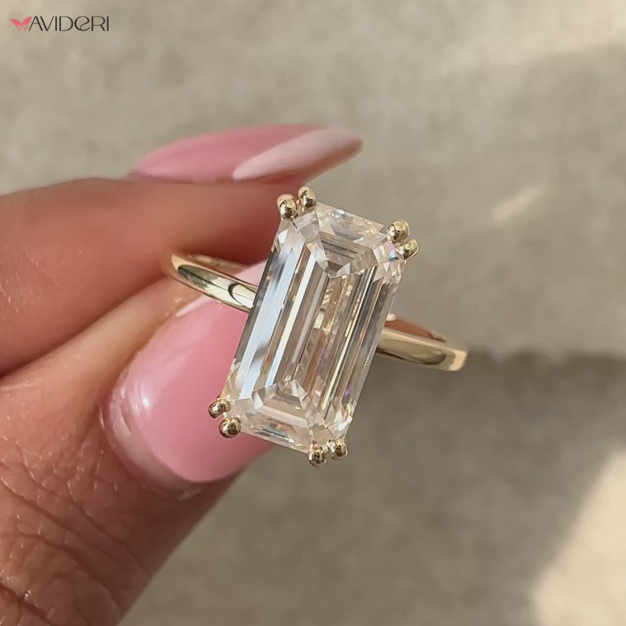 Emerald Cut Engagement Ring In Solitaire Style