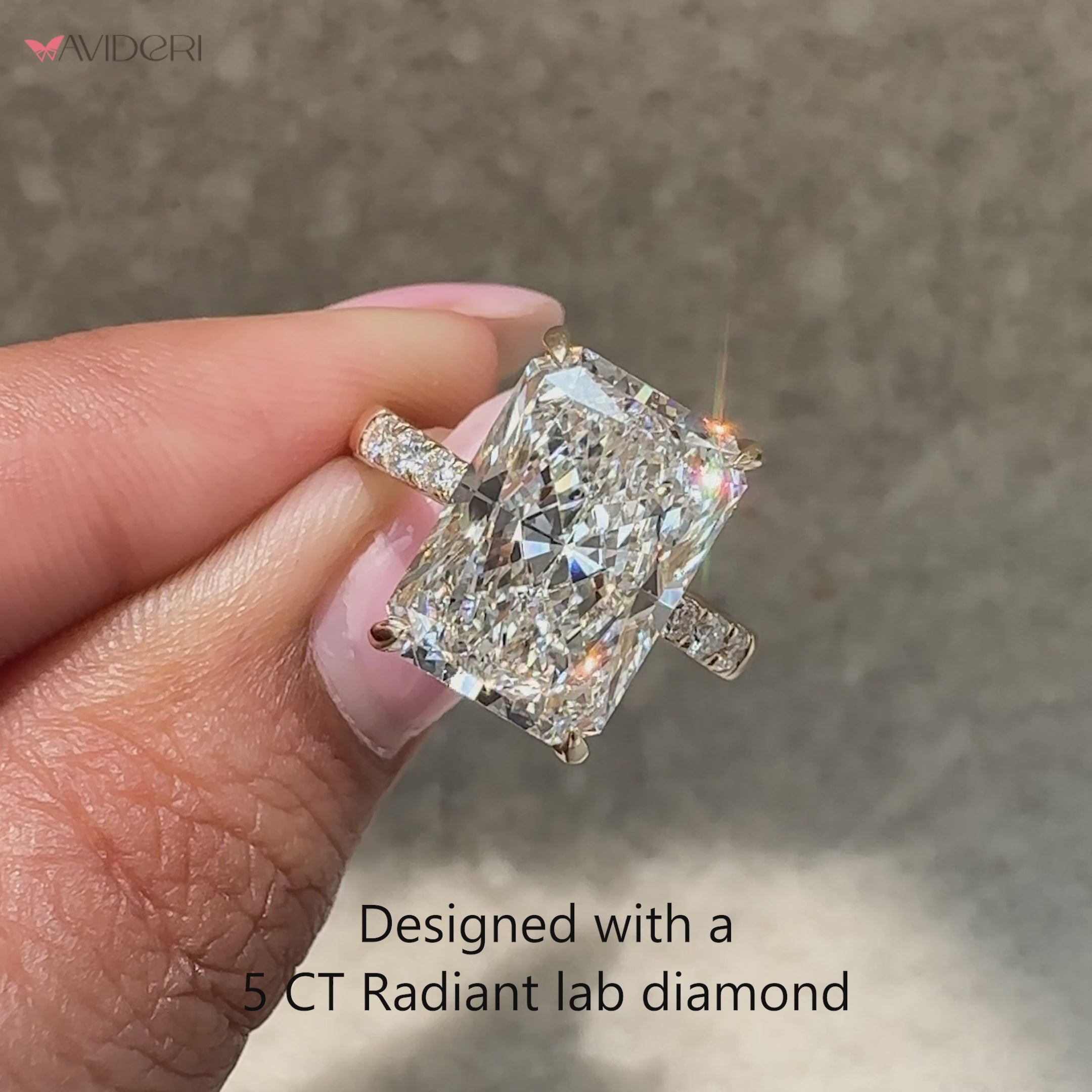 Handmade radiant cut diamond ring with secure prong setting.

