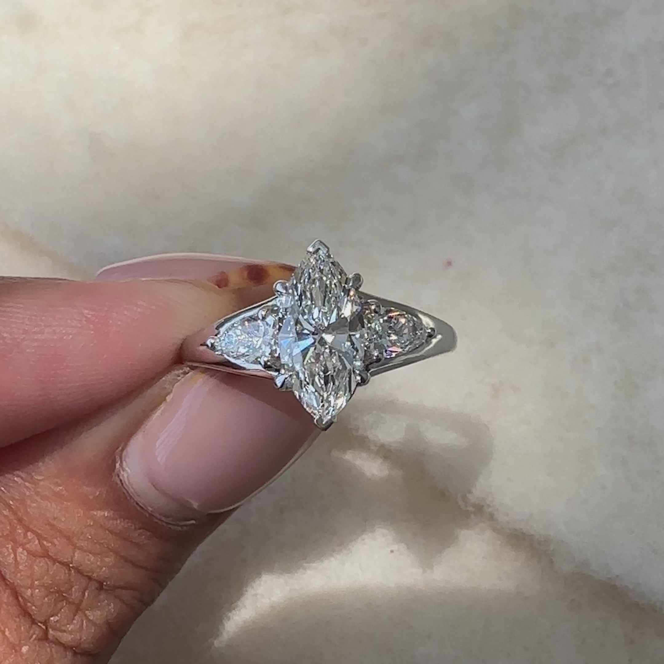 Unique marquise and pear diamond ring by Avideri.