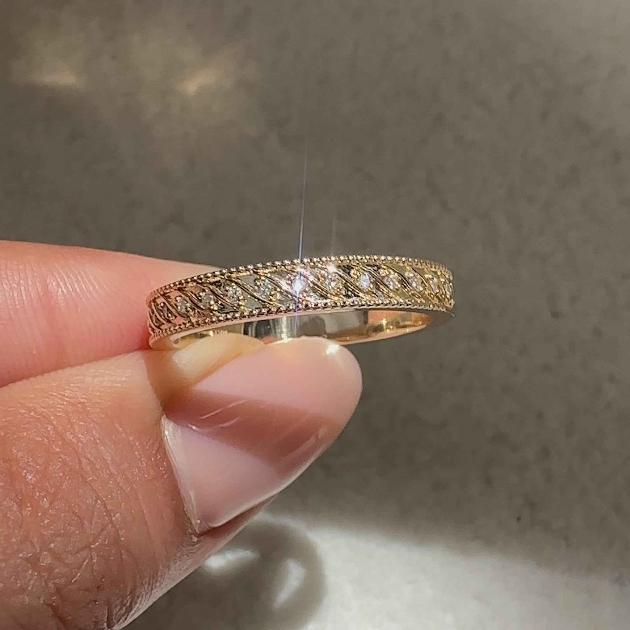 Round diamond wedding band vintage style.
