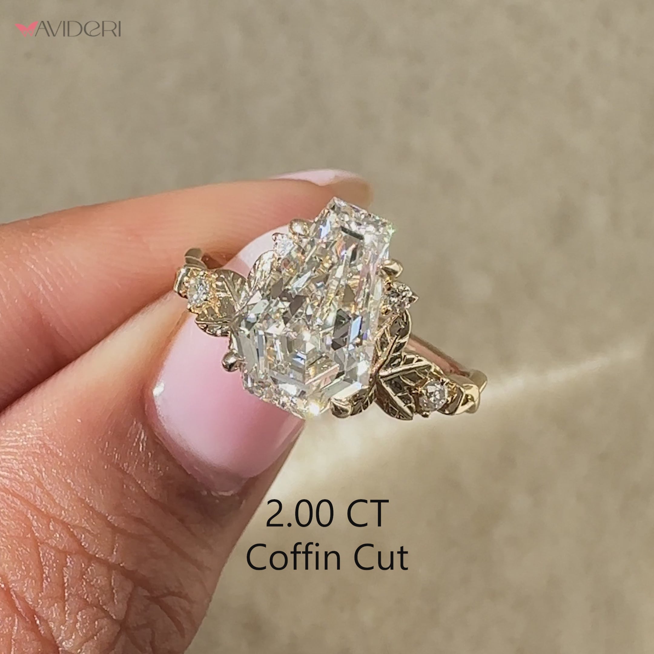 Yellow gold coffin cut engagement ring.