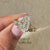 Yellow gold coffin cut engagement ring.