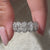 Handmade jewelry featuring a half eternity band.