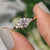 Seven stone diamond ring with igi certified lab grown diamonds set in an elegant handmade jewelry design.
