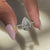 Lab grown diamond ring with pave and V prong setting.