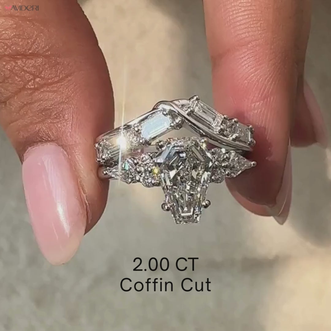 Coffin cut engagement ring with a stackable wedding band.