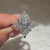 Marquise ring with round diamond pave style.
