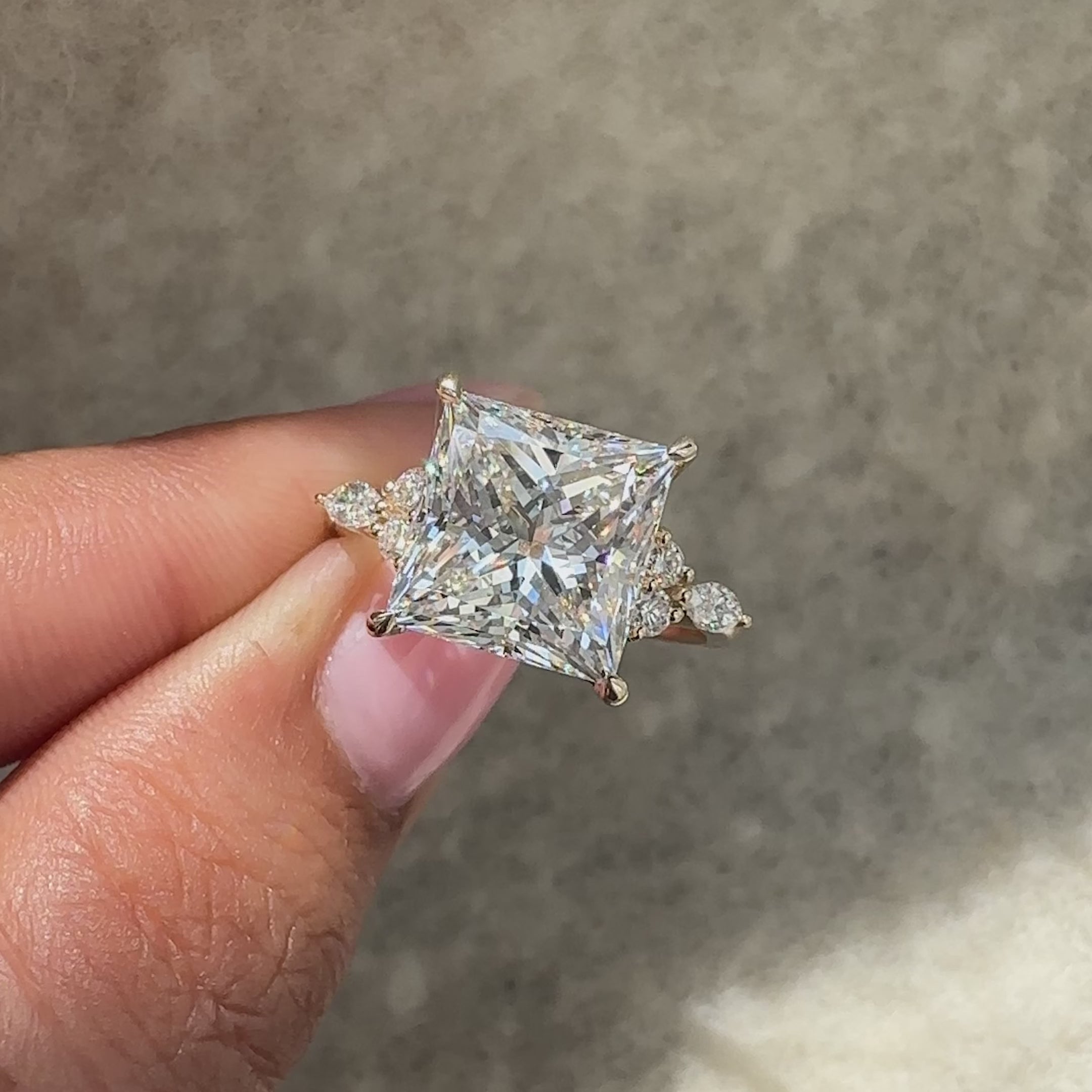 Handmade princess cut diamond ring with elegant design.