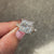 Handmade princess cut diamond ring with elegant design.