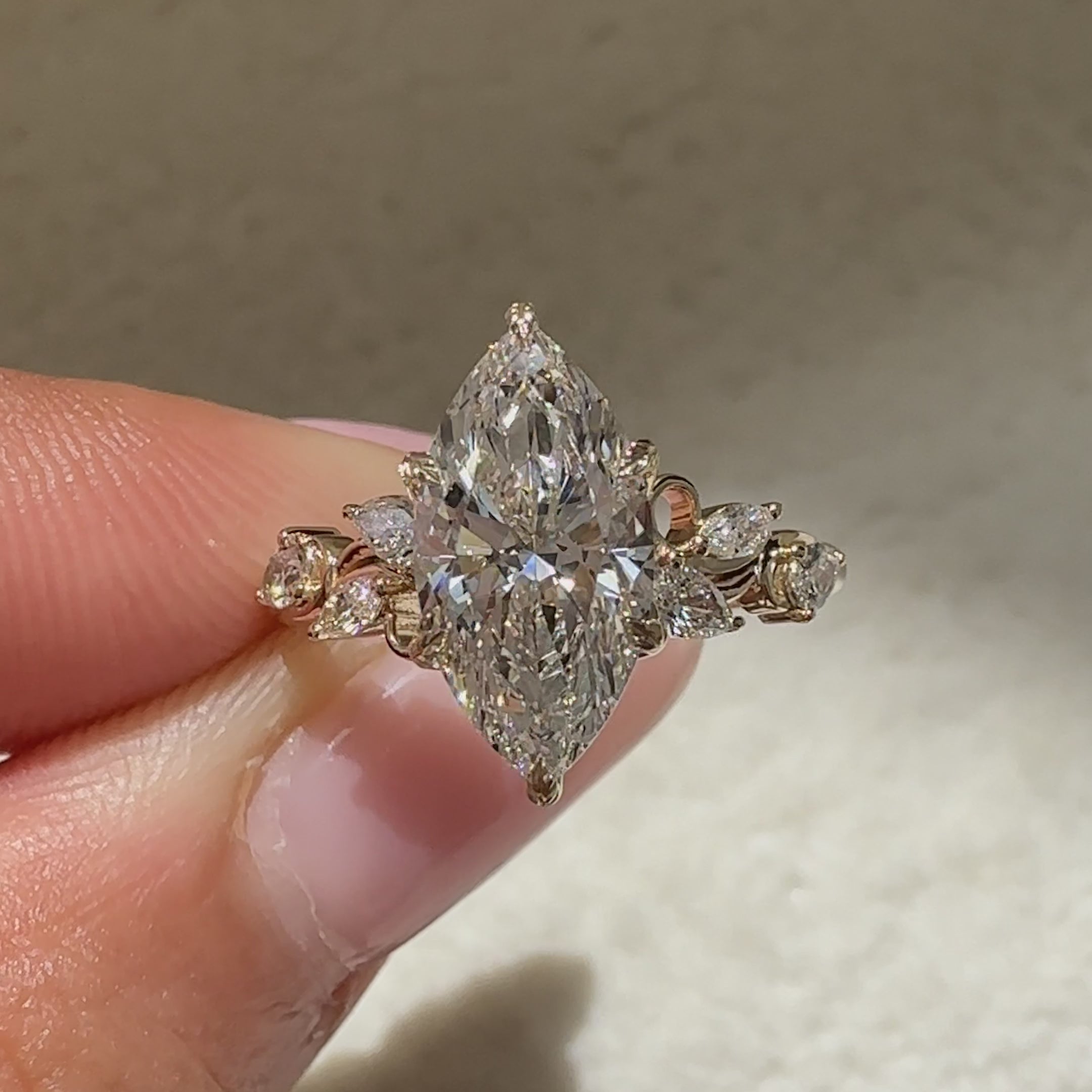 Avideri marquise diamond ring with tulip setting and leaf prongs
