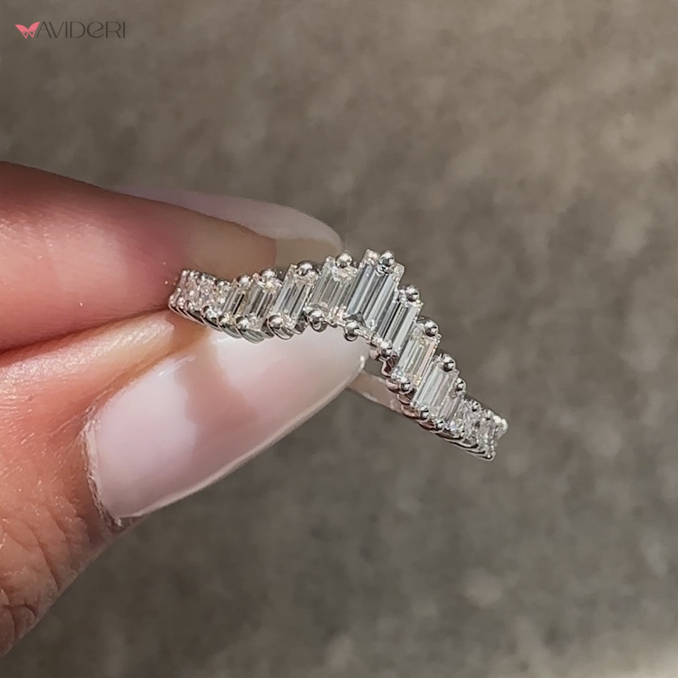 Handmade curved half eternity diamond band.
