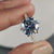 A dark blue moissanite ring that offers bold elegance for special occasions.
