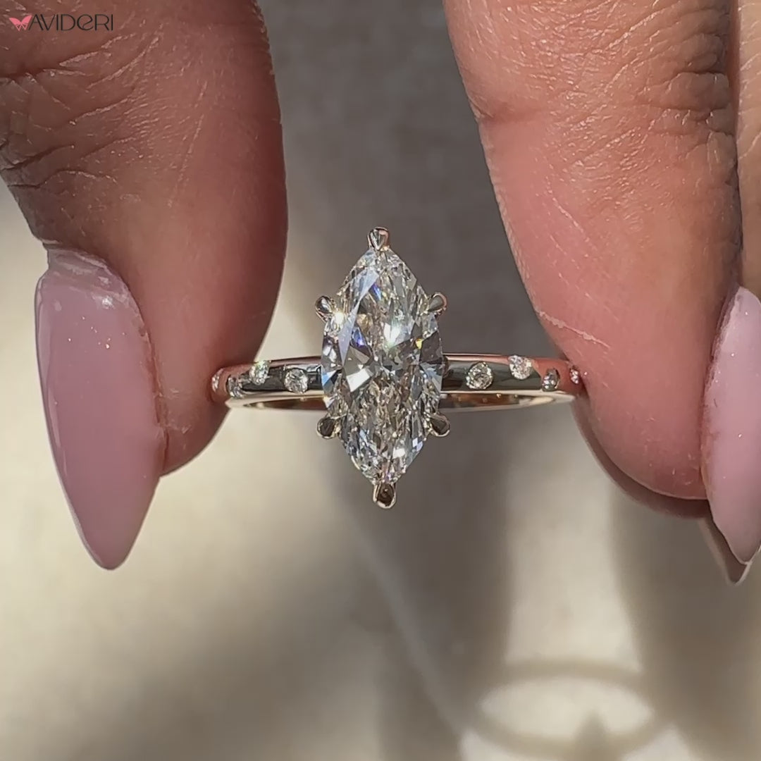 avideri engagement ring with marquise and round diamonds in unique pave shank.