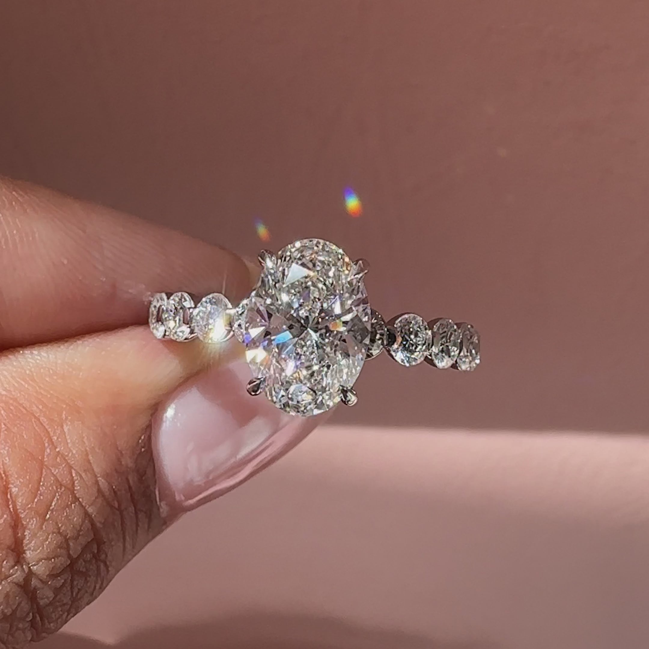 Pave style oval ring with prong setting design.
