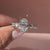Pave style oval ring with prong setting design.
