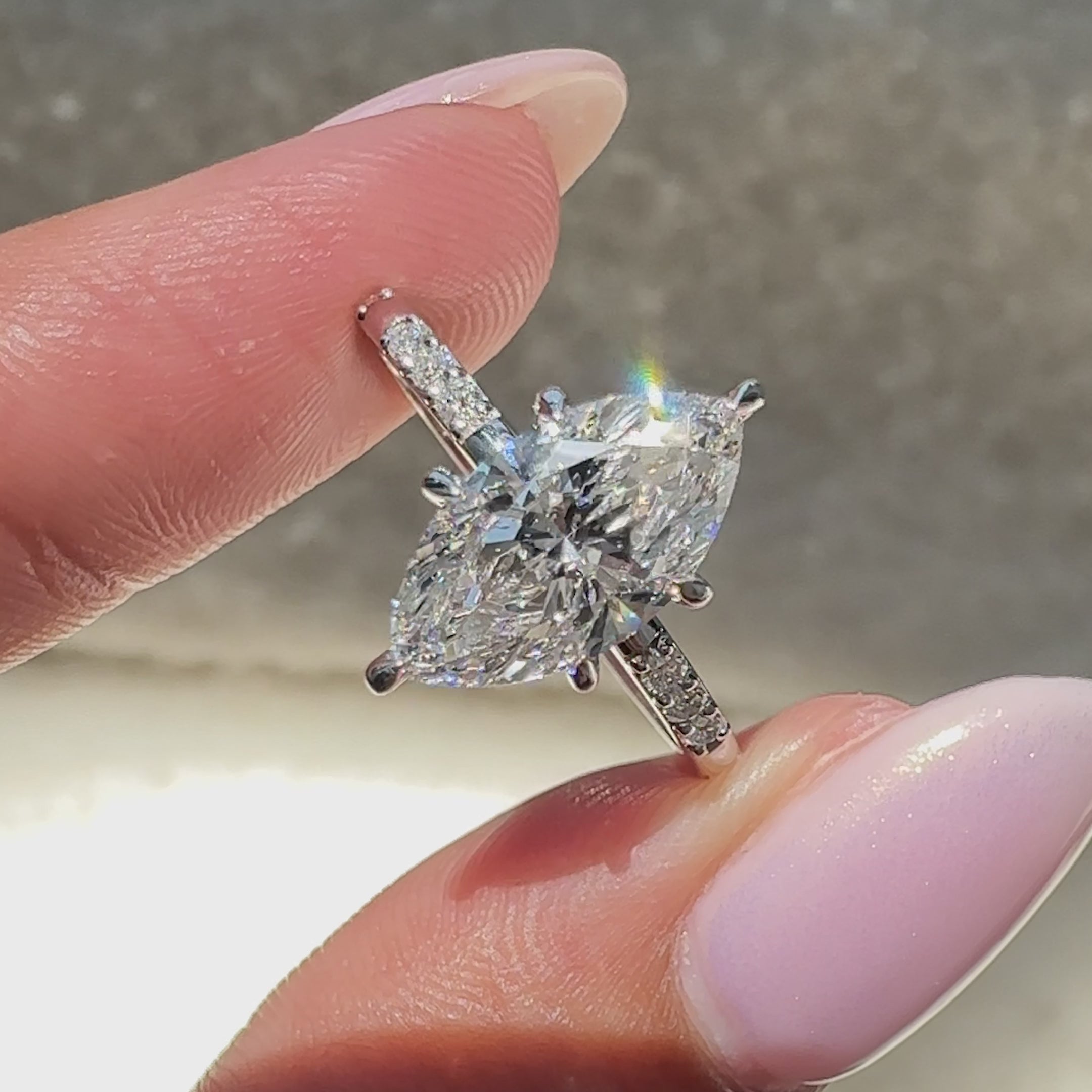 avideri ring featuring marquise diamond and round accents for unique proposals.