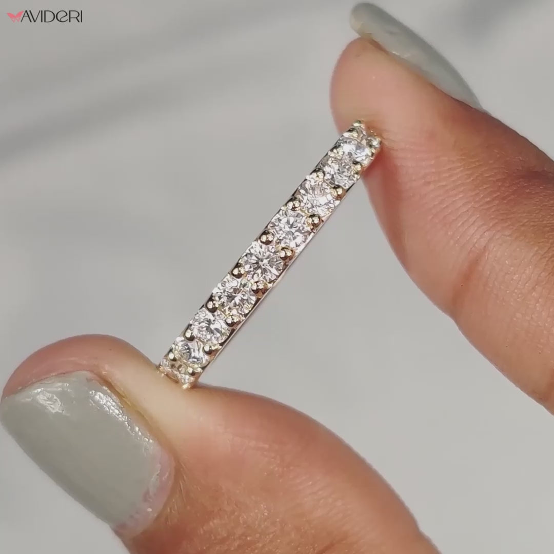 Yellow gold wedding band with a smooth, polished finish.

