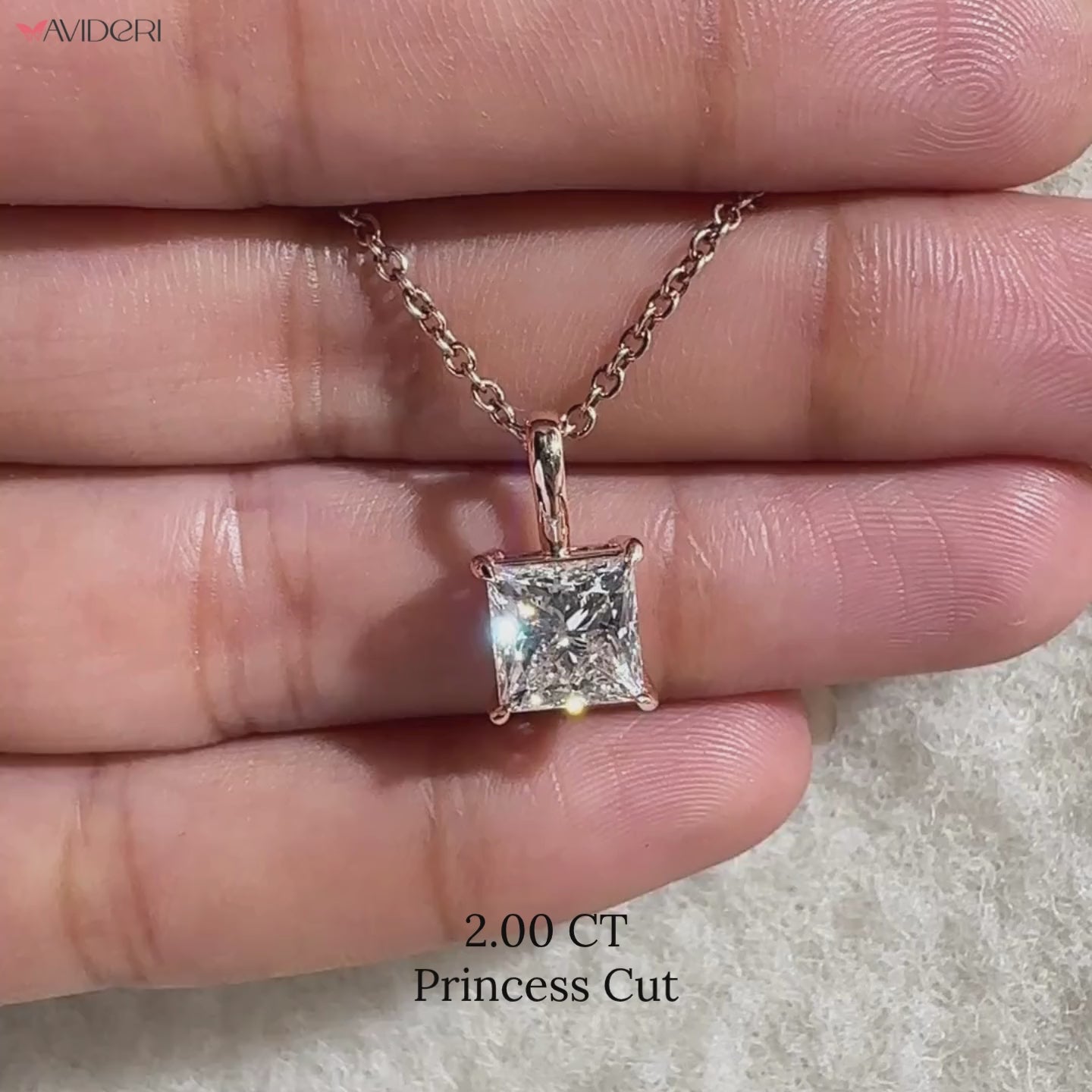 Princess cut diamond pendant in solitaire pendant.