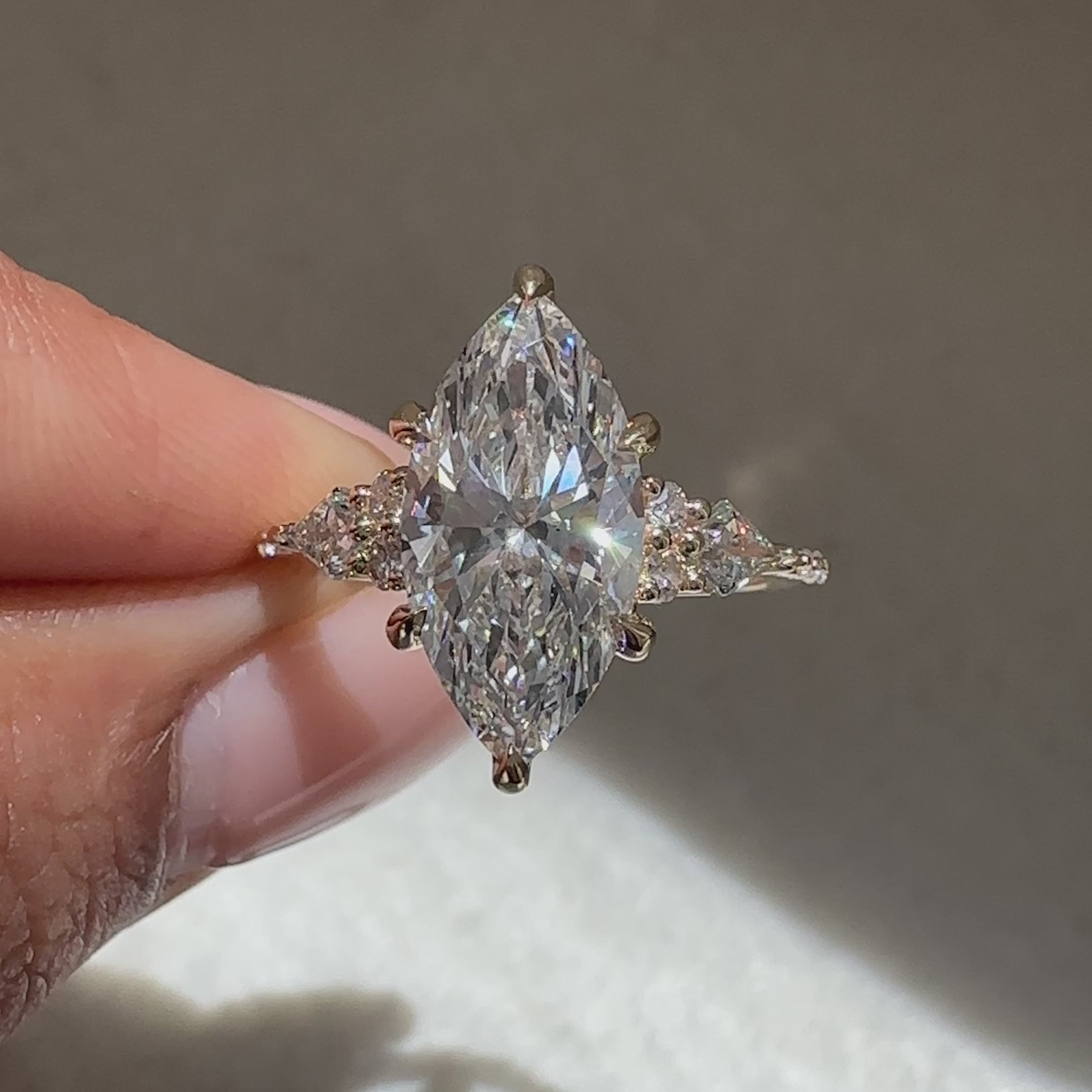 Avideri marquise ring with six claw prong setting design.
