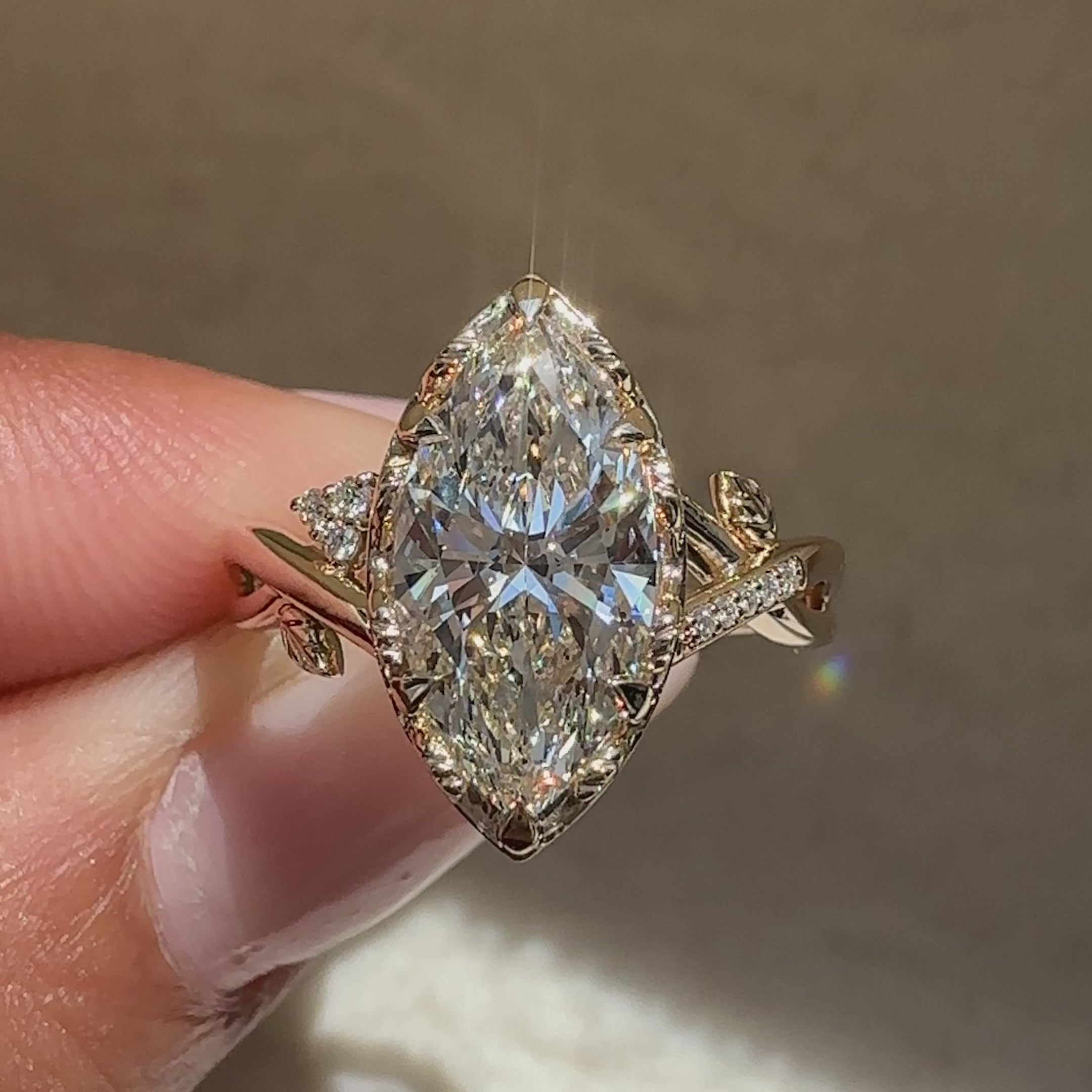 Nature inspired marquise ring with twisted pave.
