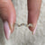 Zig zag band with diamond wedding band.