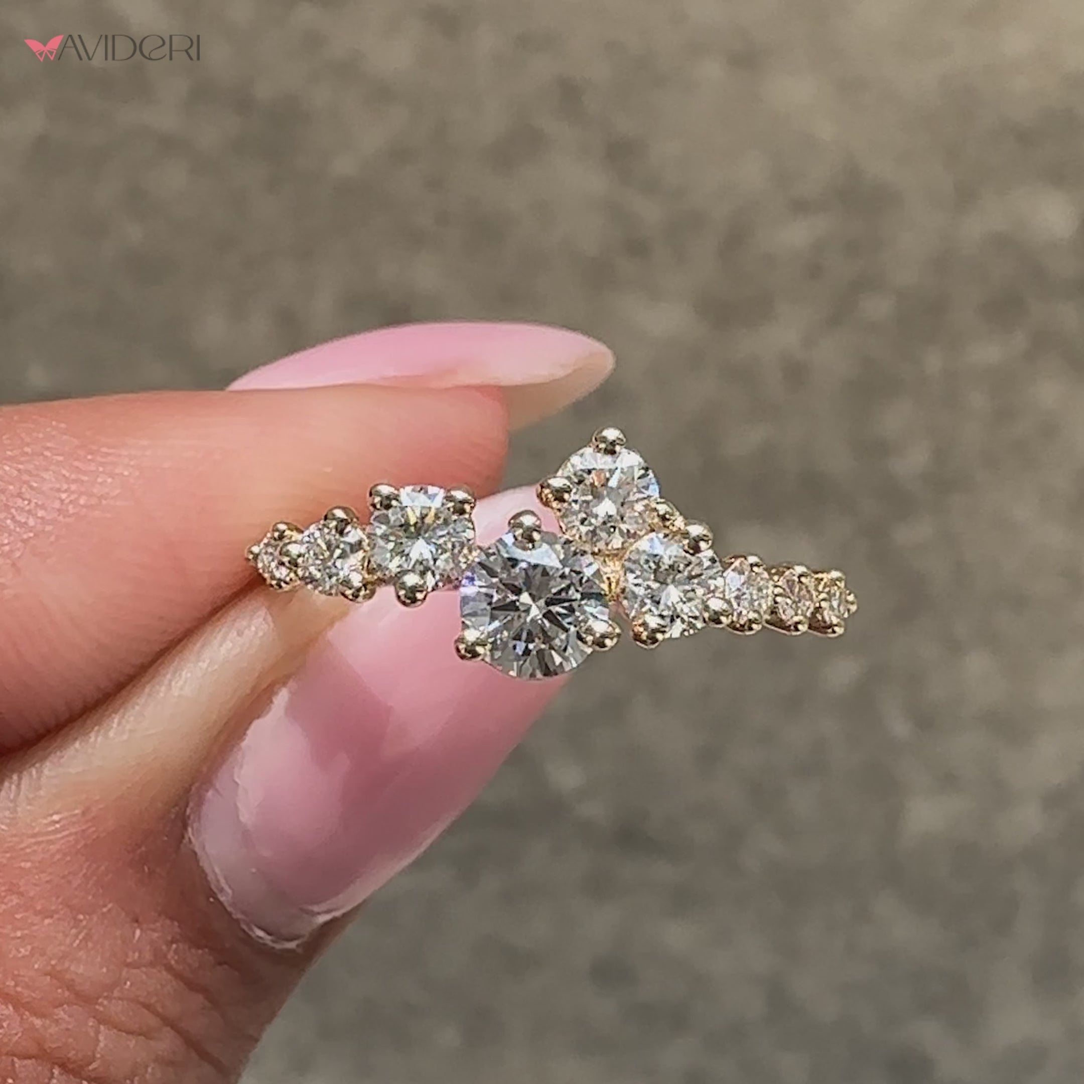 Lab grown round diamond engagement ring with cluster setting.