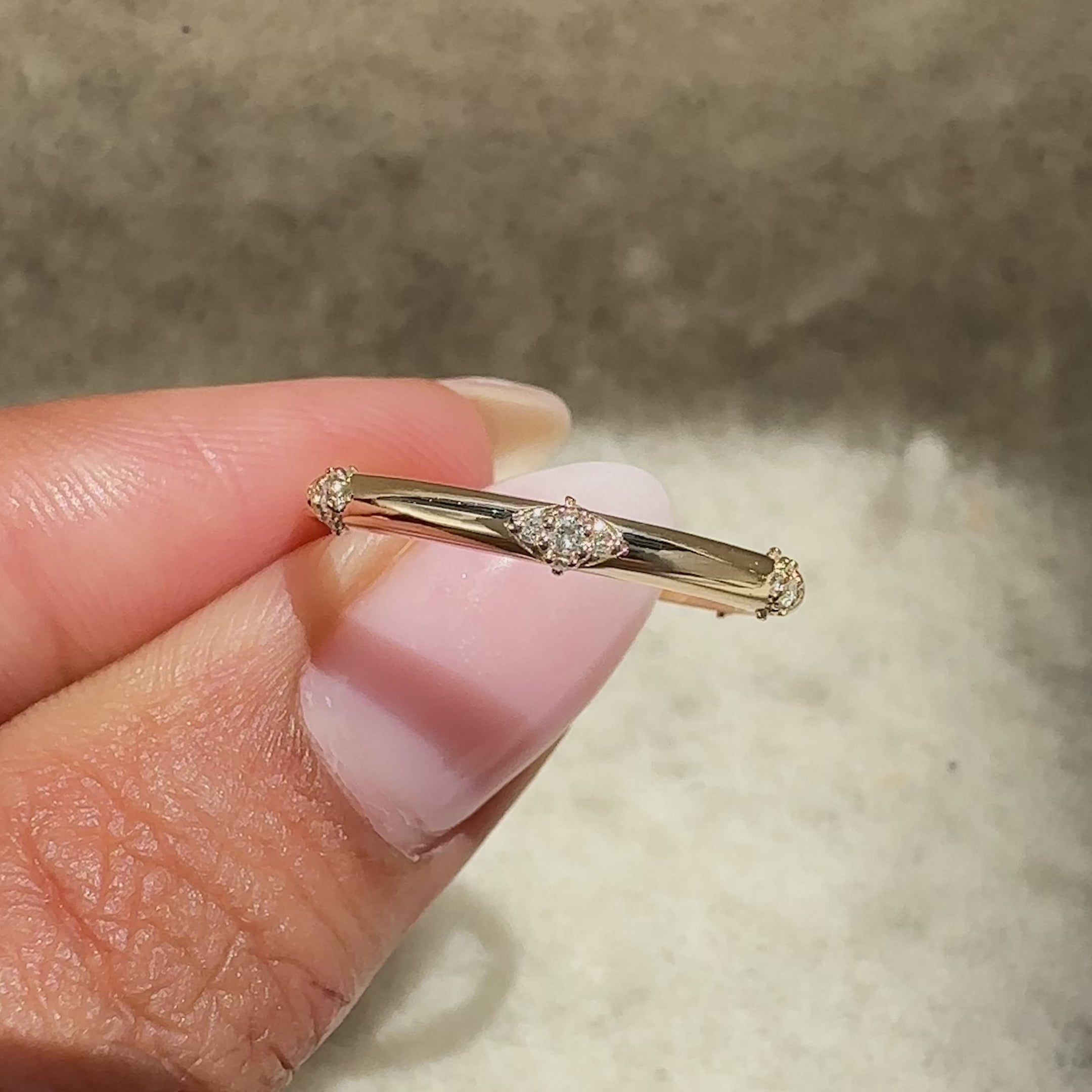 Round diamond band with prong pave style.
